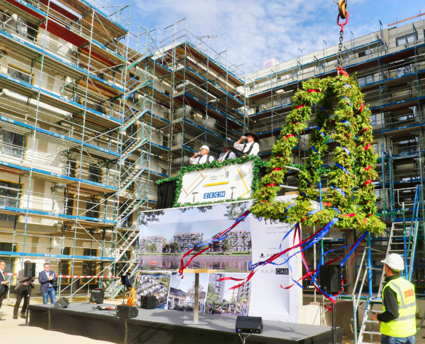 PATRIZIA Infrastructure ernennt drei neue Führungskräfte für beschleunigtes Wachstum PM_HUQ_Richtfest_Richtkranz__C__KAURI_CAB_-_PATRIZIA